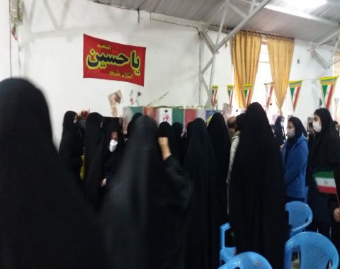 بدرقه شهید گمنام بر دستان دانش آموزان مجتمع دخترانه امام حسین (ع)